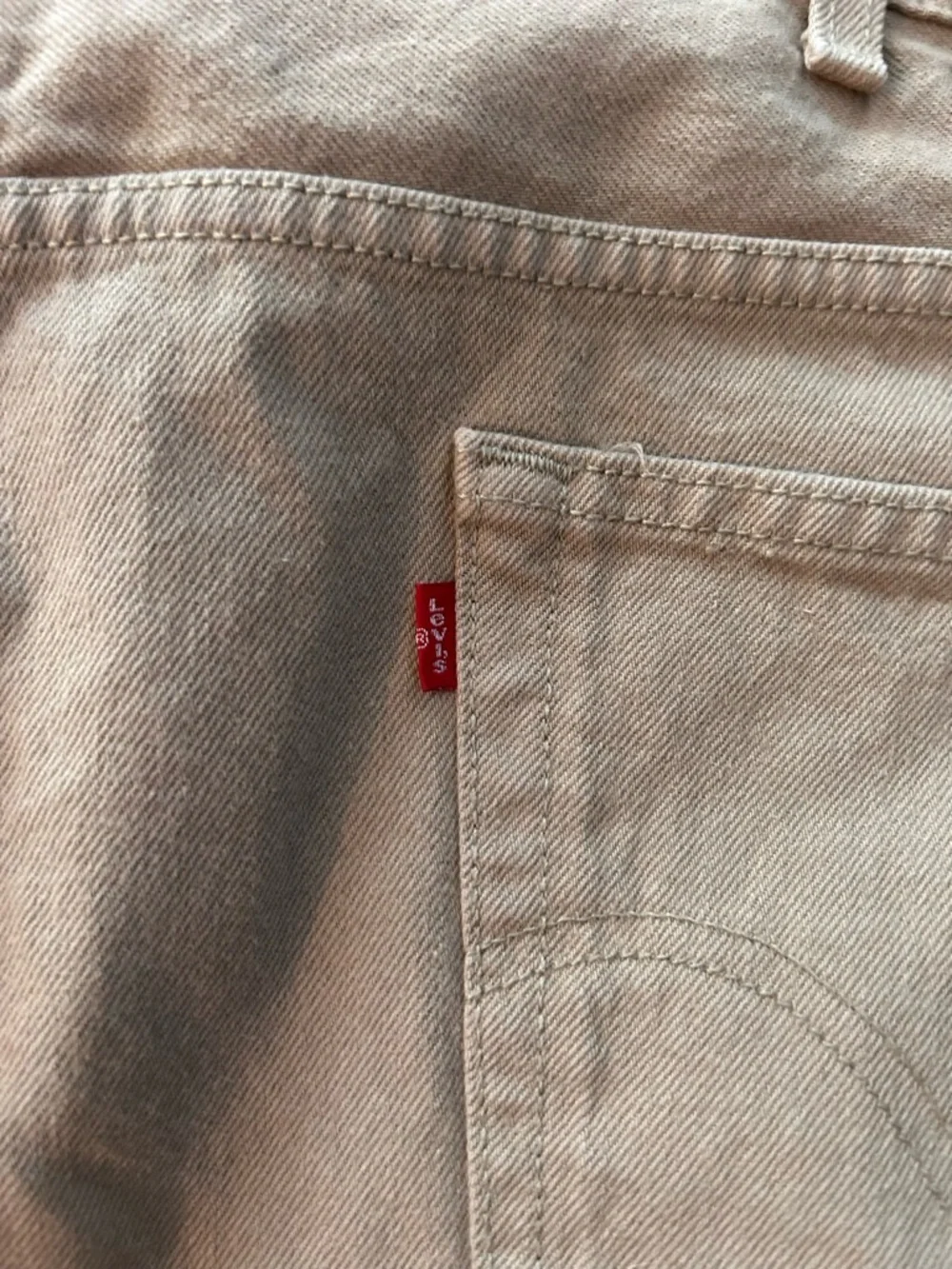 Levi's relaxed fit 550 jeans in khaki tan.  Size 44X30. Cotton